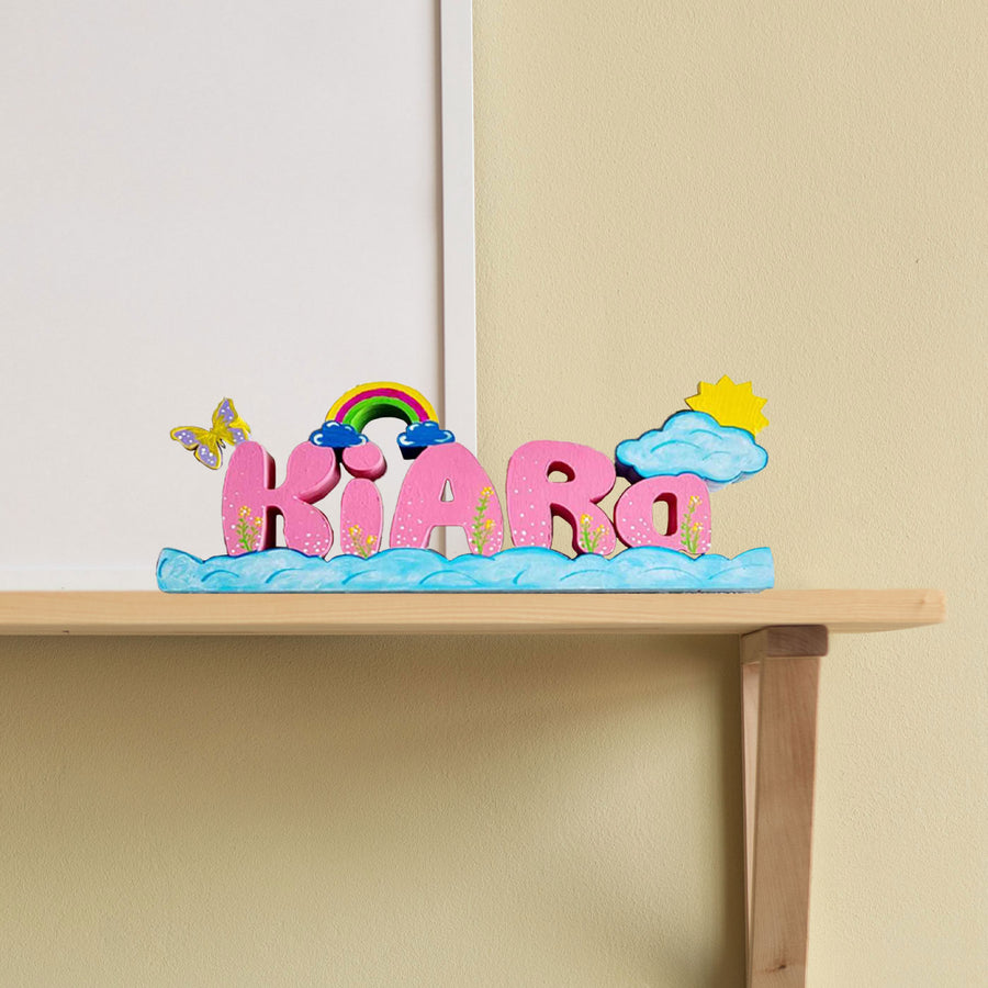 Handcrafted Personalized Rainbow Themed 3D Name Block For Kids - Front View on Shelf Display