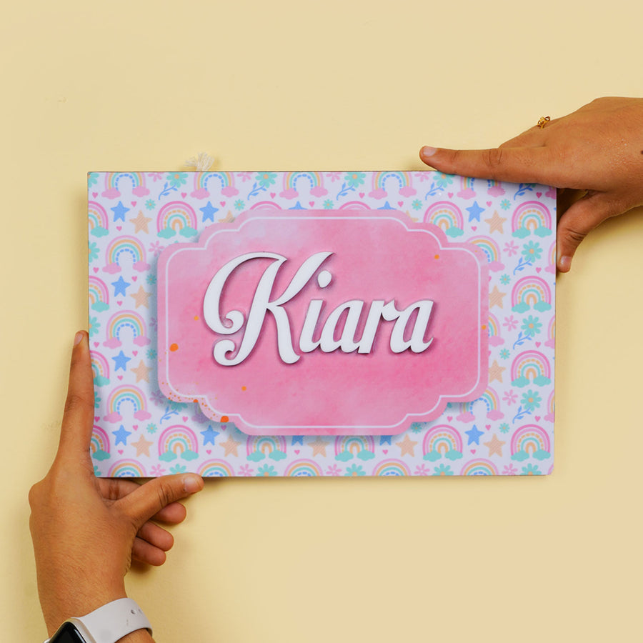 Personalized Rainbow Printed Kids Name Plate With 3D Letters - Name Personalization Example Held by Hands