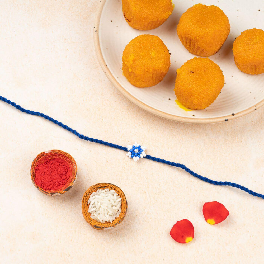Handcrafted Glass Beads Tara Rakhi 2 - Rakhi with Traditional Puja Items