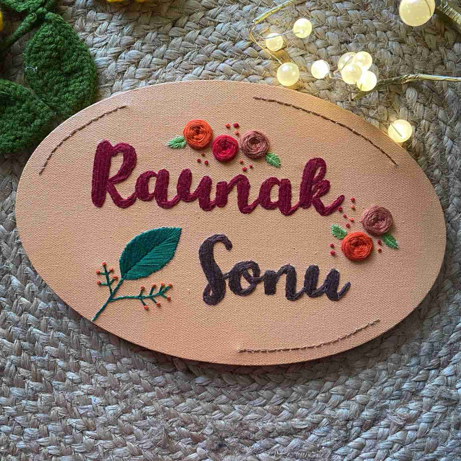 Hand Embroidered Canvas Oval Floral Name Plate - Top-down View of Embroidered Oval