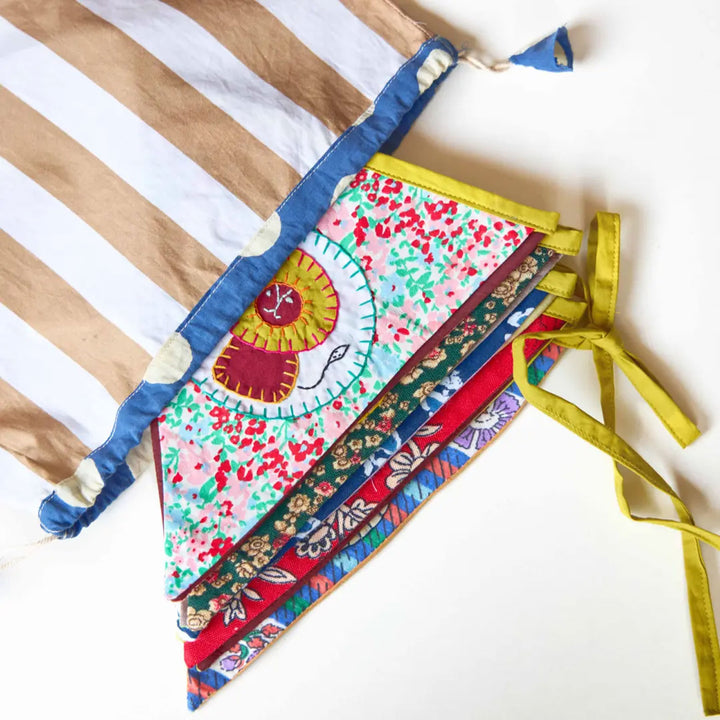 Upcycled Fabric Kids Animal Theme Bunting - Product Folded and Partially Inserted in Bag