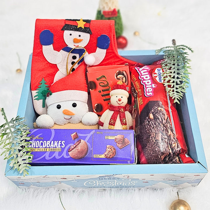 Personalized Christmas Gift Hamper | Includes 1 Ornament, 1 Stocking, 1 Snowman Candle, 1 Brownie Cake, 1 Cadbury Chocobakes, 1 Nutties Pack