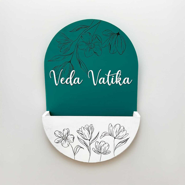 Personalized Handmade White And Green Floral Mdf Wood Name Plate - Front View Hanging on Wall
