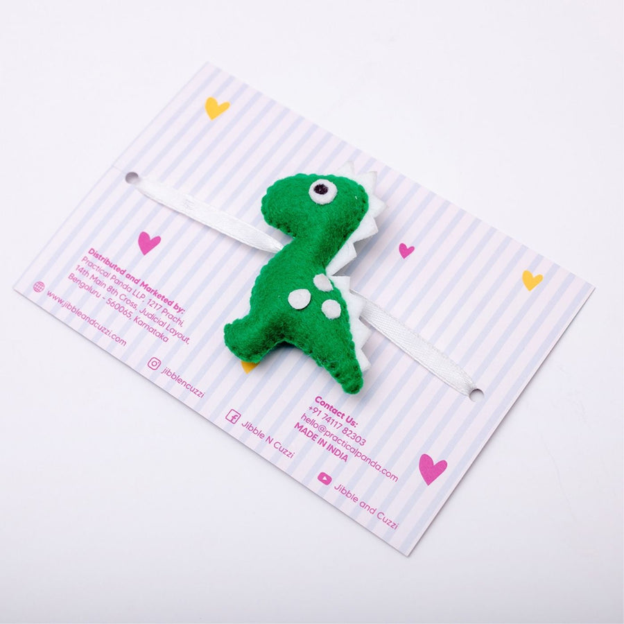 Handmade Dino Delight Felt Kids Rakhi - Front View of Bracelet on Card