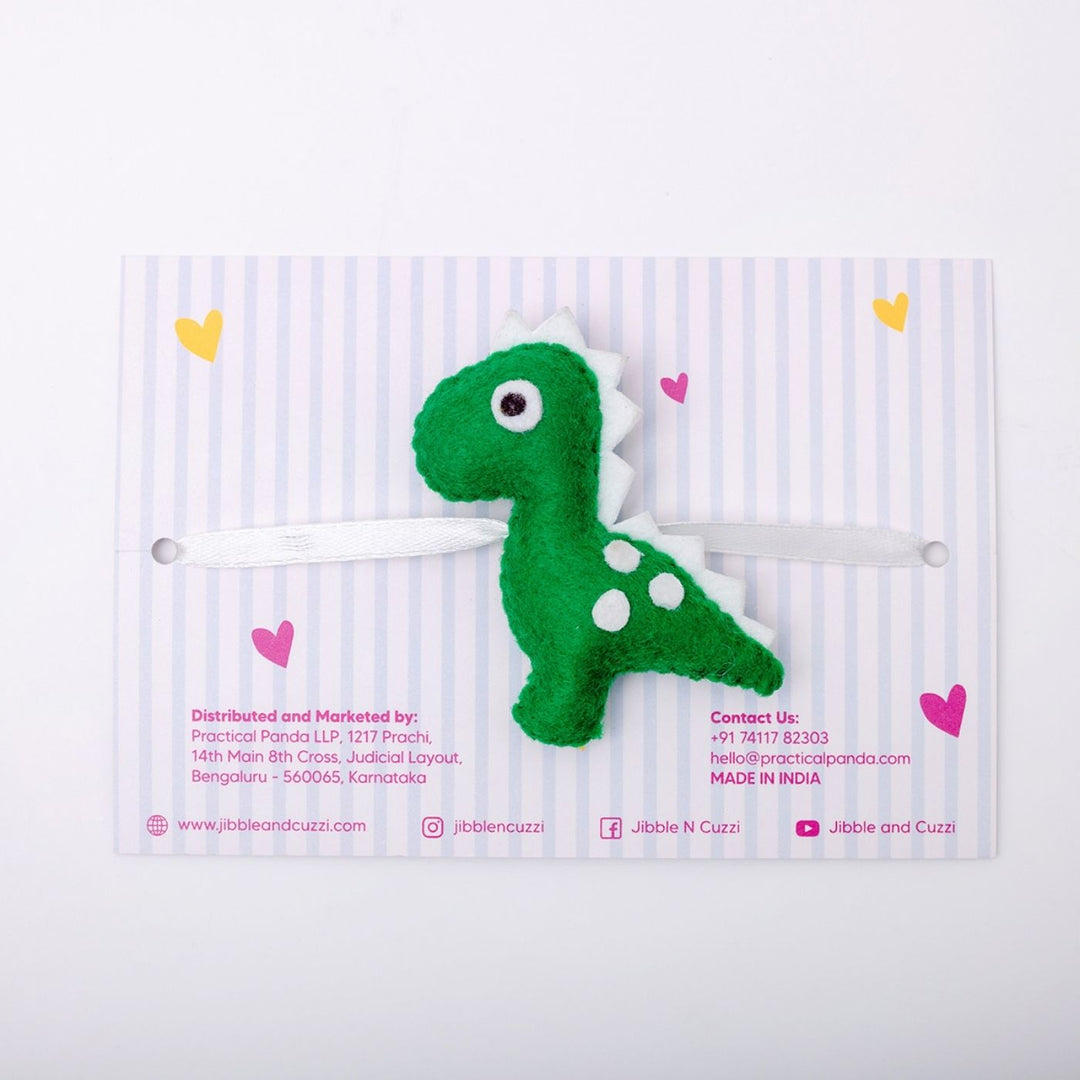 Handmade Dino Delight Felt Kids Rakhi - Side View of Bracelet on Card