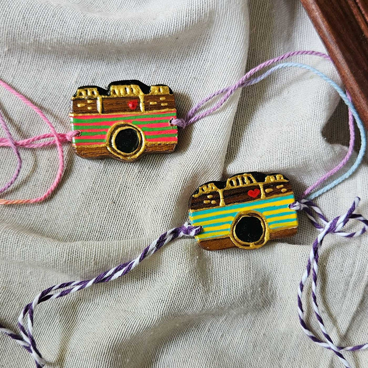 Handpainted Quirky Wooden Rakhi With Roli Chawal 7 - Multiple Items Displayed Side-by-Side