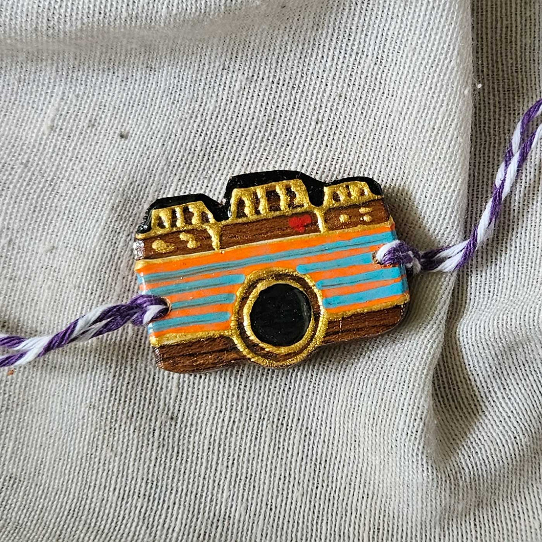 Handpainted Quirky Wooden Rakhi With Roli Chawal 7 - Front Close-up