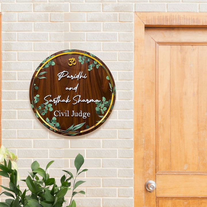 Personalised Wooden Floral Round Nameplate Copy 3 - Mounted on Brick Wall Near Door