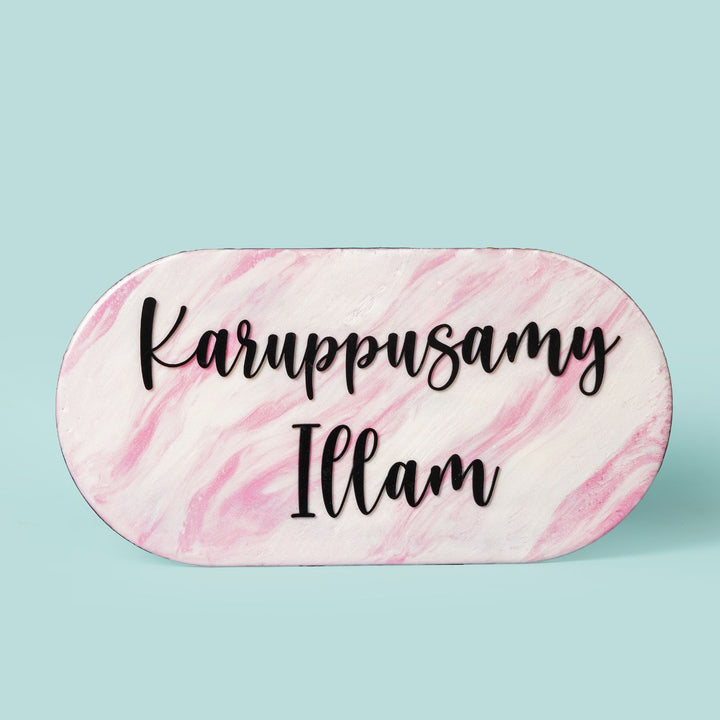 Handmade Resin Pink Black Oval Marbled Name Plate - Front View on Flat Surface