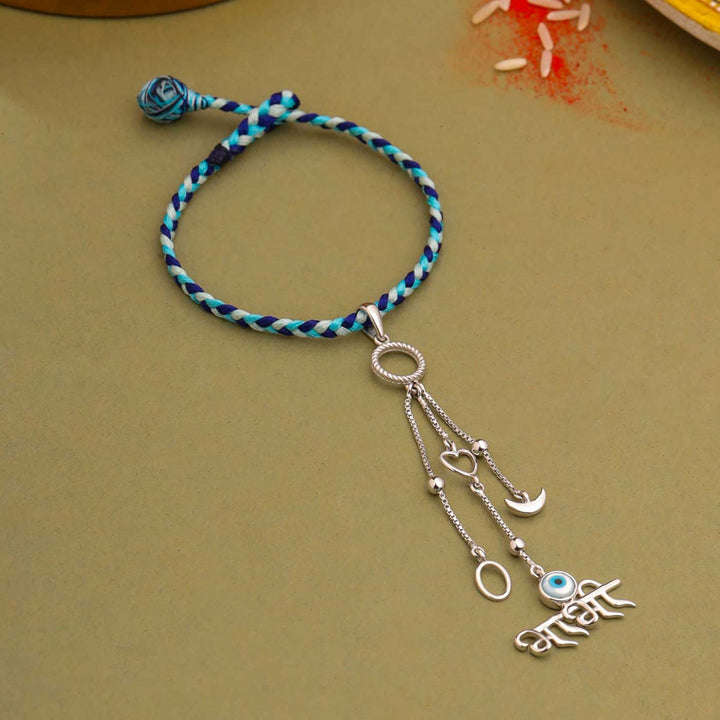 Handmade Evil Eye Design Silver Lumba Rakhi For Bhabhi 1 - Flat Lay with Full Bracelet