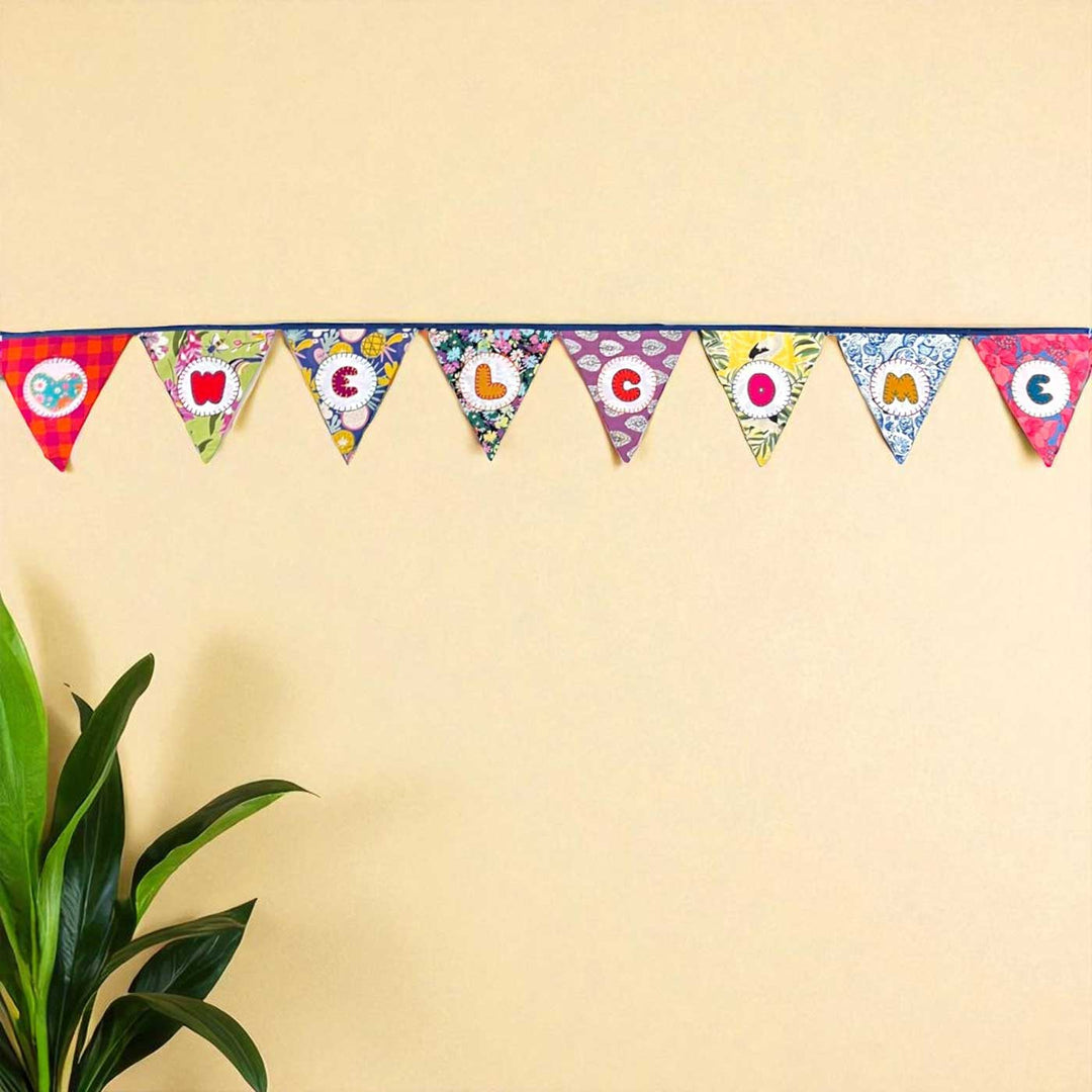 Handmade Multicolored "Welcome" Upcycled Fabric Bunting