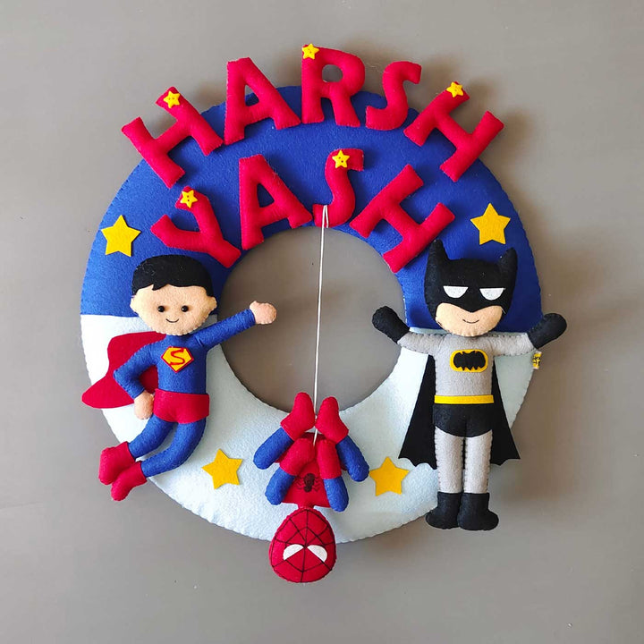 Personalized Superhero Theme Felt Kids Name Plate For Siblings - Front View Hanging on Wall