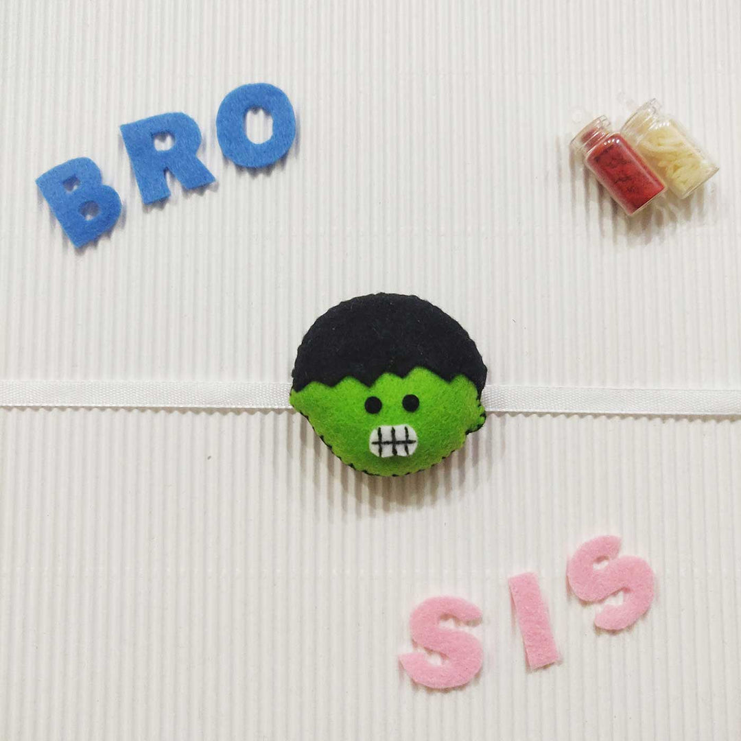 Handmade Hulk Theme Felt Kids Rakhi With Roli Chawal - Green Character with BRO and SIS Letters