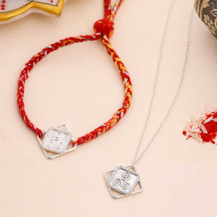 Handmade Three Swirl Design Silver Rakhi For Brother - Bracelet and necklace with background elements