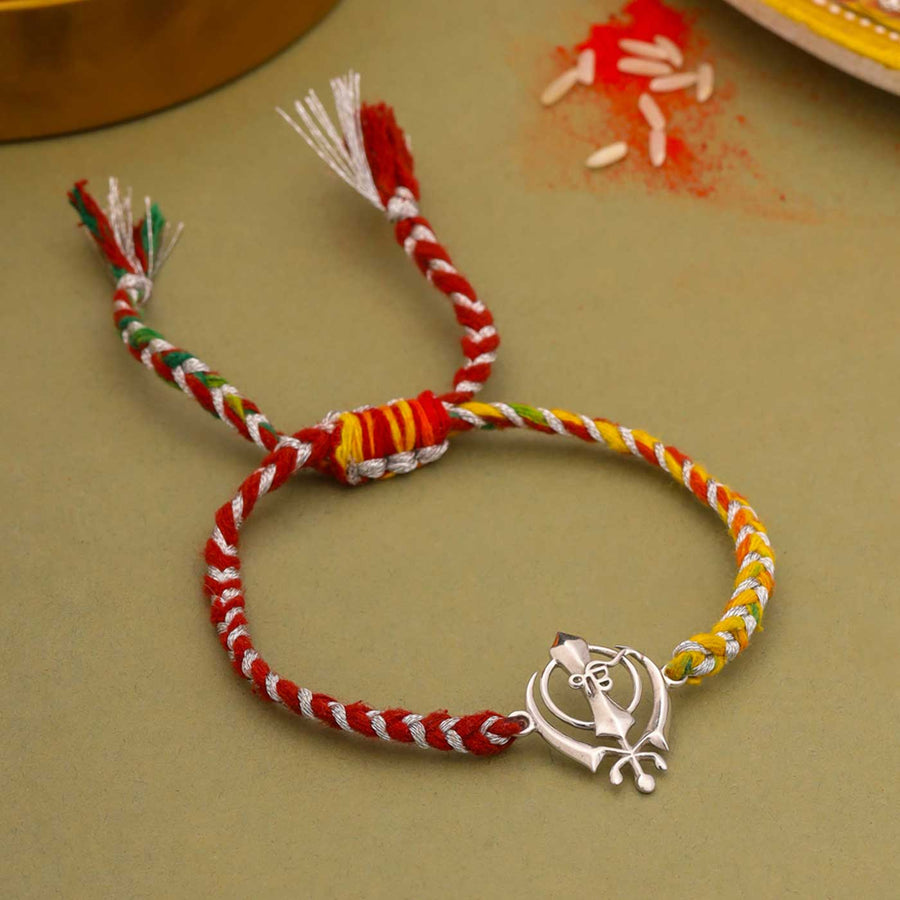 Handmade Sikh Design Religious Silver Rakhi For Brother - Flat Lay with Full Bracelet