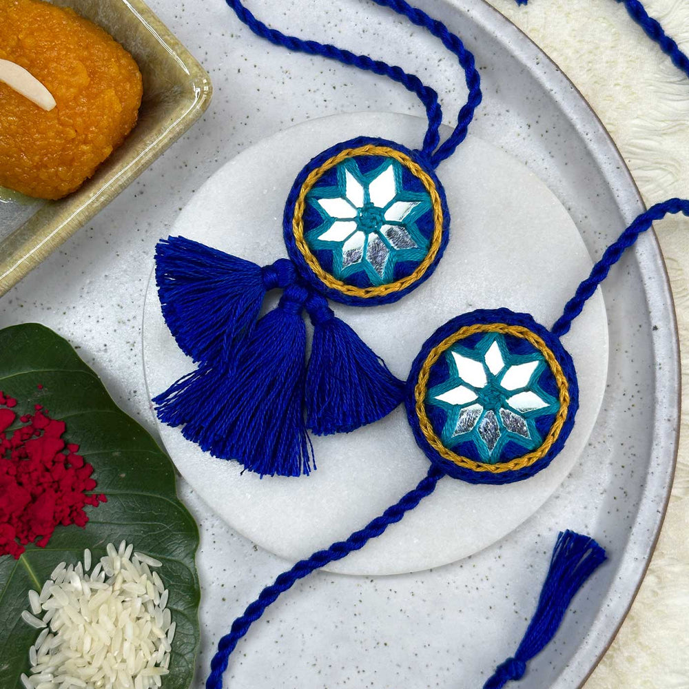 Customized Handmade Mirror Work Cotton Bhaiya Bhabhi Rakhi With Roli Chawal - Front View with Decorative Setup