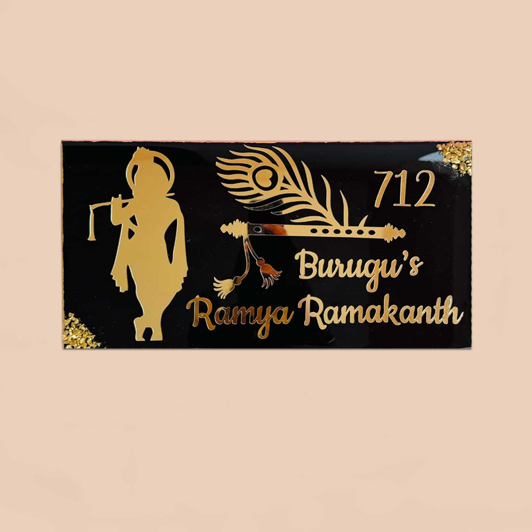 Personalized Black And Gold Krishna Theme Resin Name Plate For Family - Front View on Neutral Background