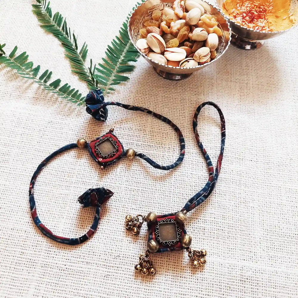 Handmade Dori Work Antique Ajrakh Bhaiya Bhabhi Rakhi With Roli Chawal Set Of 2 - Styled with Decorative Items