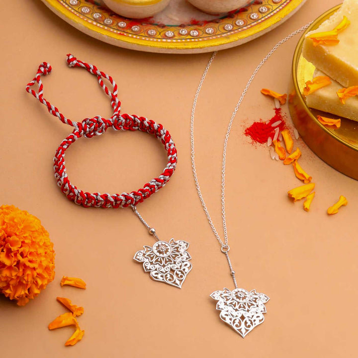 Handmade Ornate Filigree Design Silver Lumba Rakhi For Bhabhi - Styled Rakhi and Pendant Arrangement