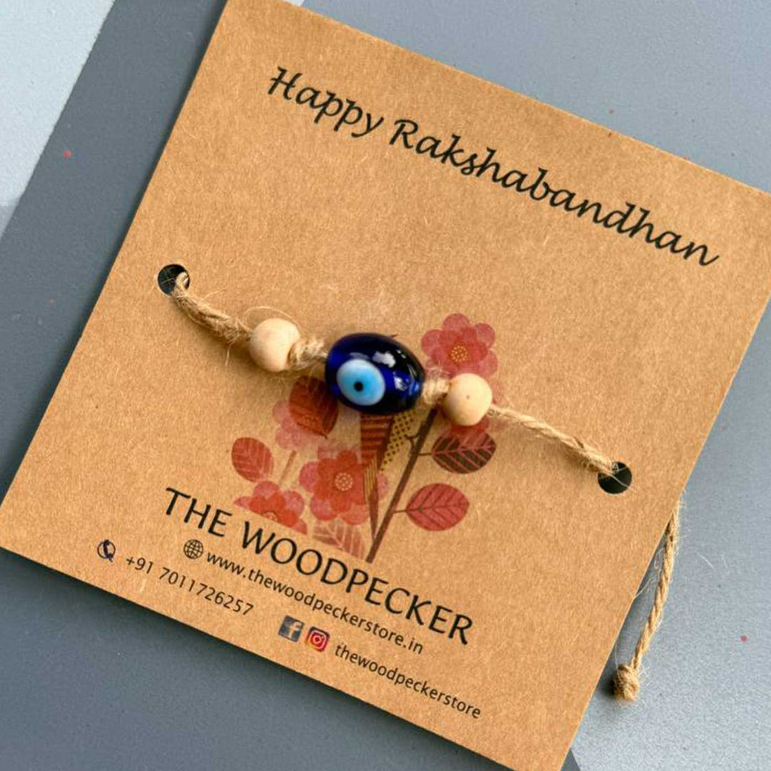 Personalized Hand Painted Evil Eye Rakhi With Roli Chawal - Front View