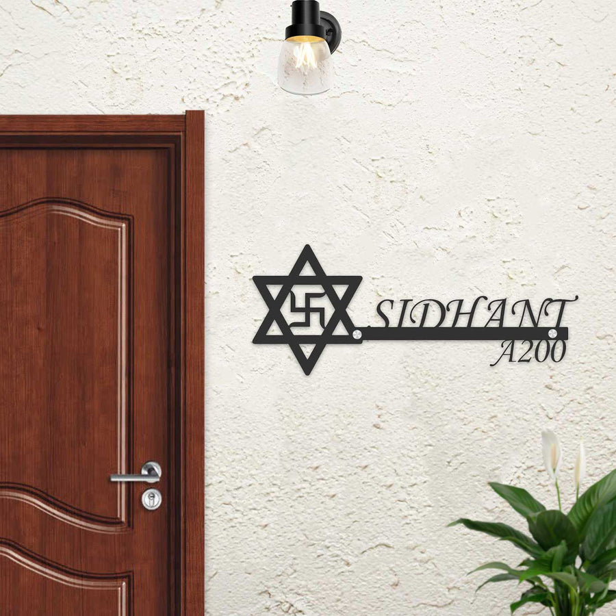 Personalized Swastik And Star Laser Cut Metal Name Plate - Mounted on entryway wall