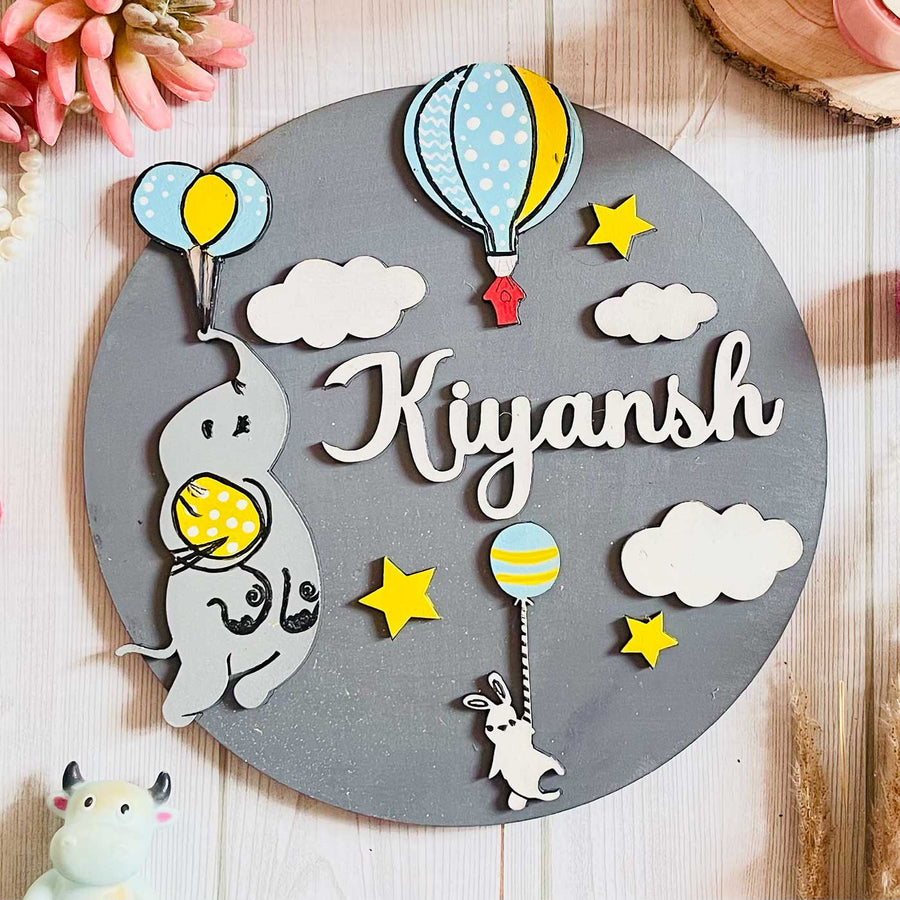 Personalized Hand Painted Flying Dumbo Mdf Wood Kids Name Plate - Top-down view of personalized name plaque