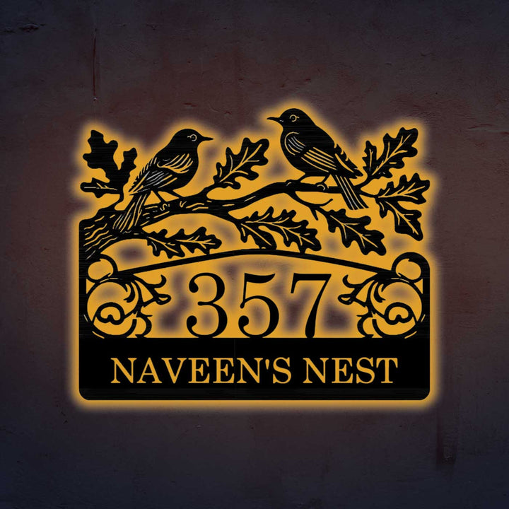 Personalized Laser Cut Birds Theme Steel Name Plate - Front View Illuminated on Wall