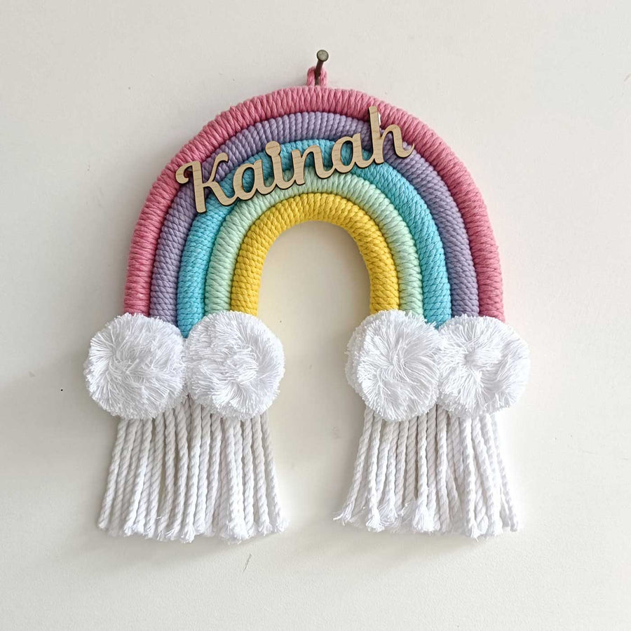 Personalized Macrame Rainbow Name Plate - Hanging from Wall Hook Front View