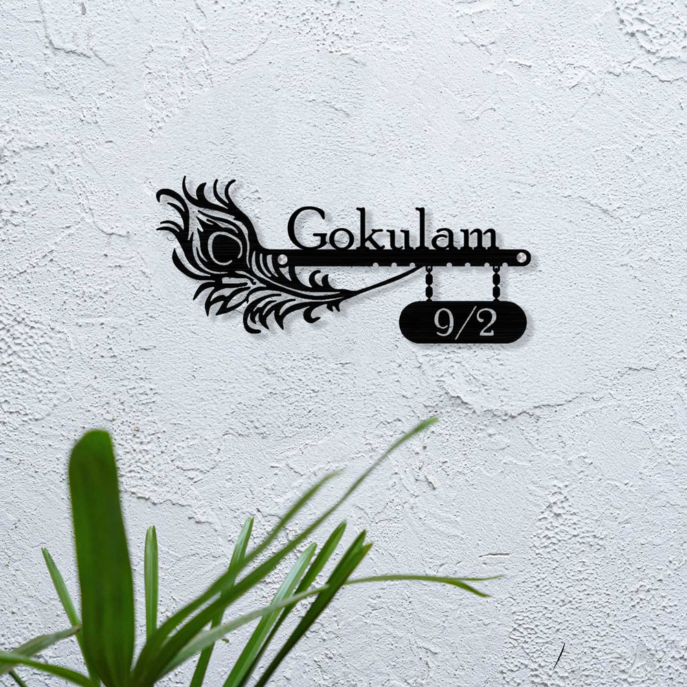 Personalized Laser Cut Peacock Feather Theme Steel Name Plate 10 - Mounted on Textured Wall