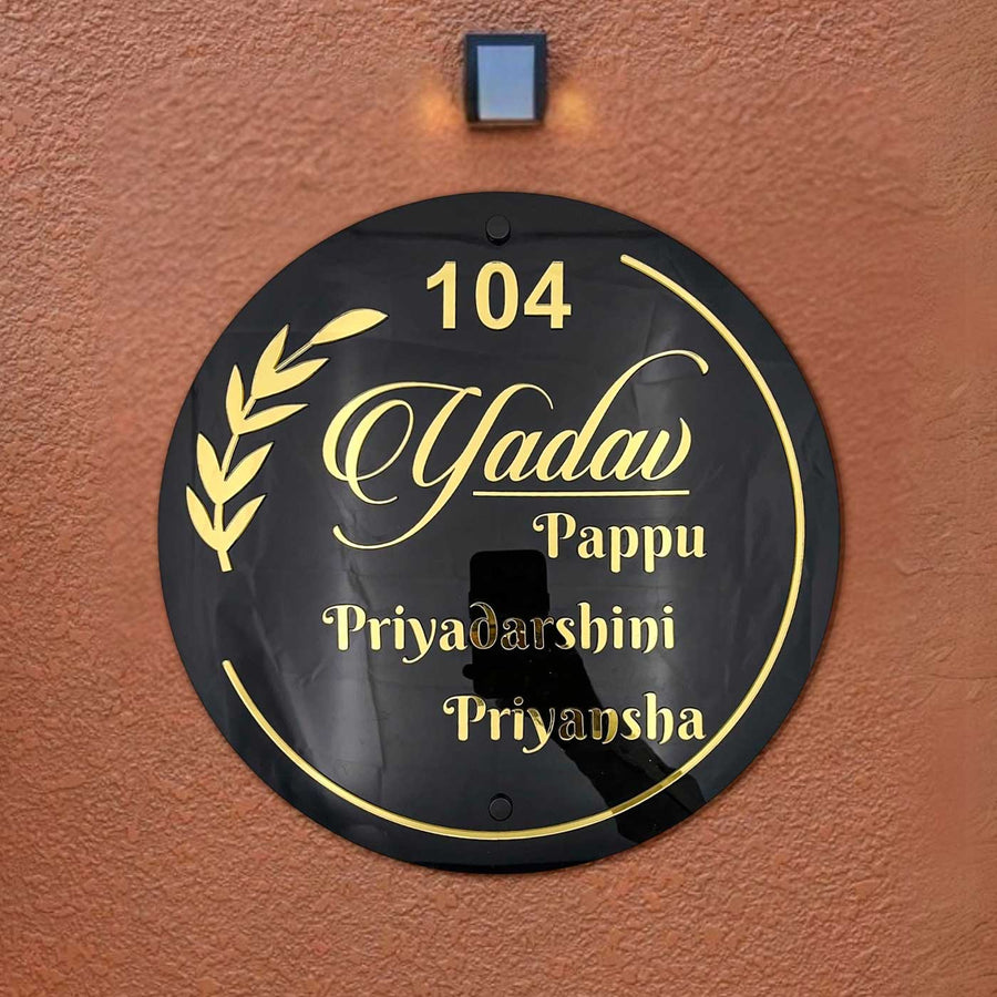 Personalized Gold And Black Acrylic Name Plate - Mounted on Exterior Wall Close-up