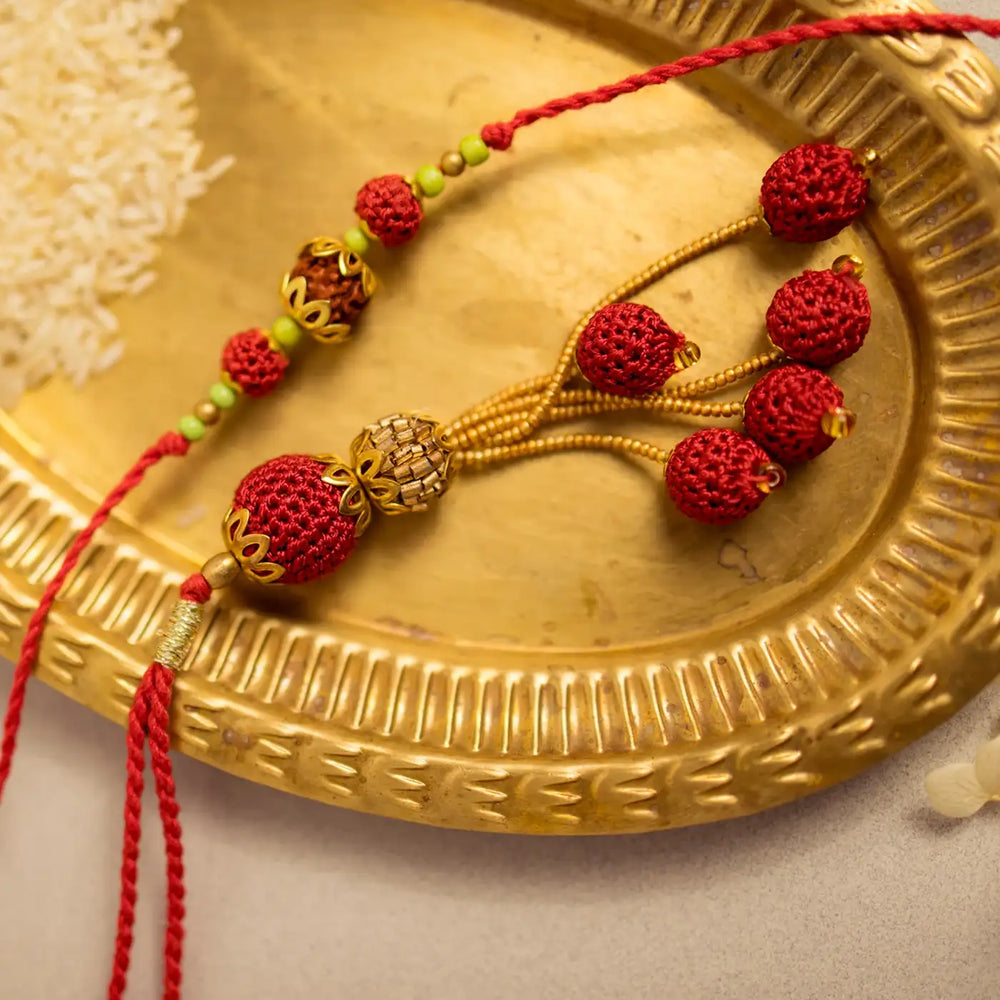 Handmade Crochet Rudraksh Bhaiya Bhabhi Rakhi With Roli Chawal Set Of 2 - Close-up of beaded tassel detail