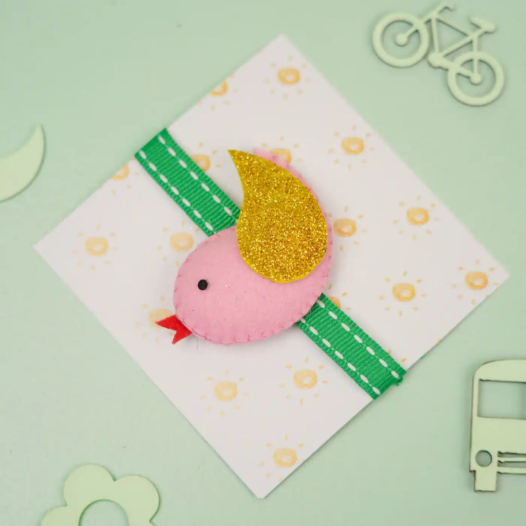 Handmade Bird Theme Felt Kids Rakhi With Roli Chawal - Decorative card with pink bird accessory