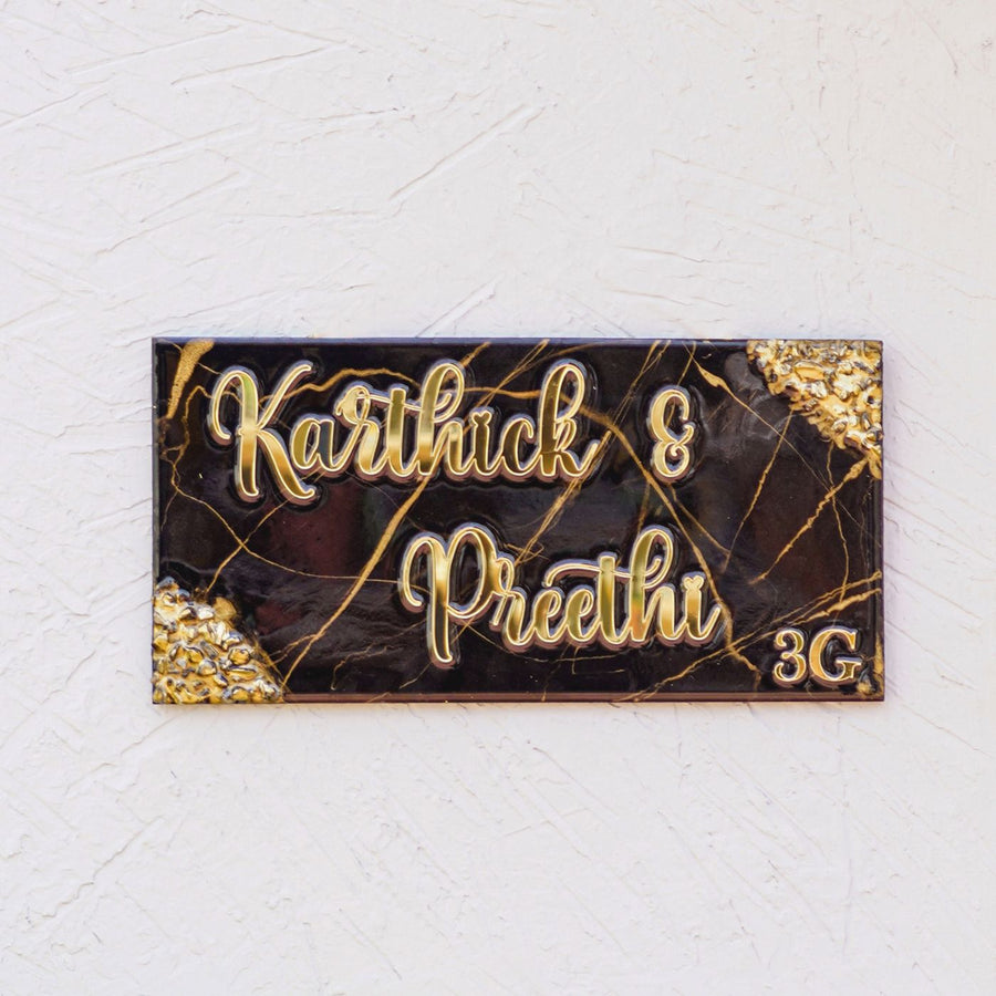 Handmade Resin Black Gold Rectangle Marbled Name Plate - Mounted on Textured Wall Front View