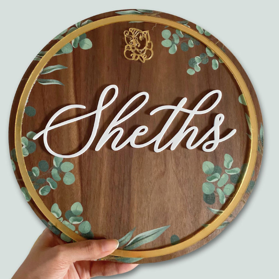 Personalised Wooden Floral Round Nameplate 3 - Handheld Front View with Personalization
