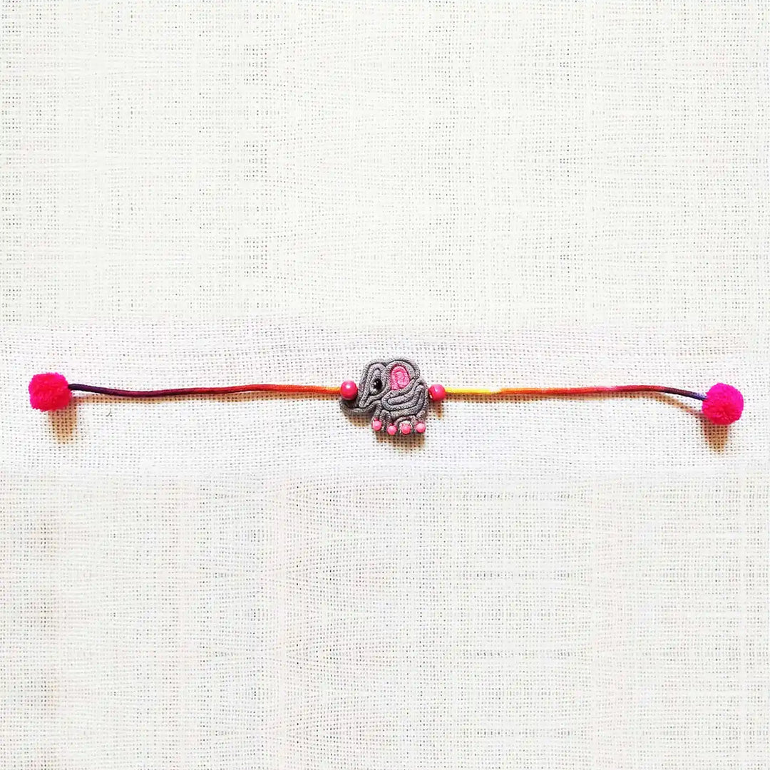 Handmade Dori Work Elephant Kids Rakhi With Roli Chawal - Full Length View of Bracelet