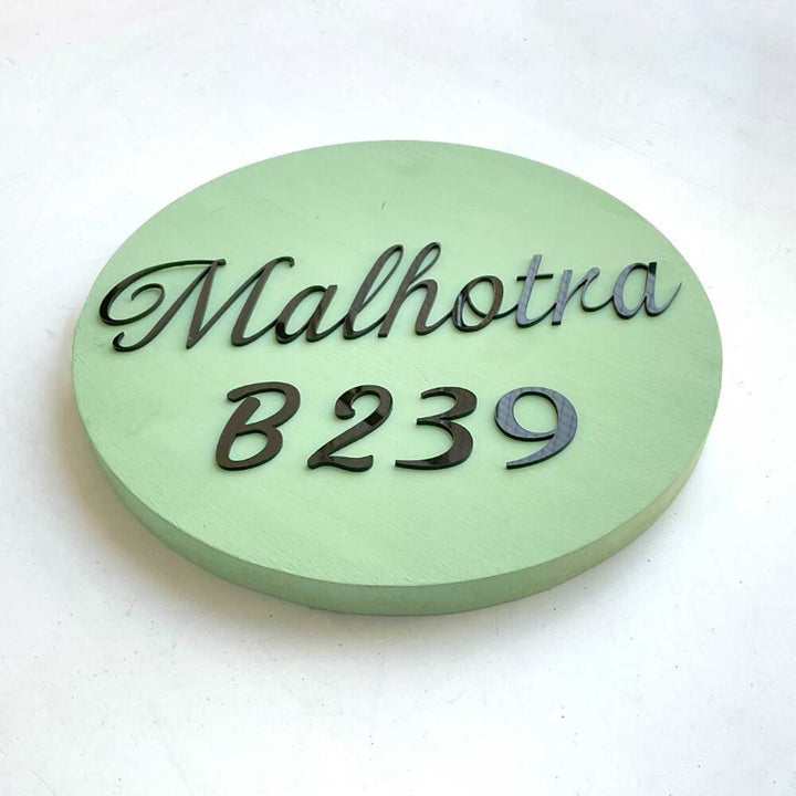 Personalized Minimal Sage Green Mdf Wood Name Plate - Angled Top View on Flat Surface