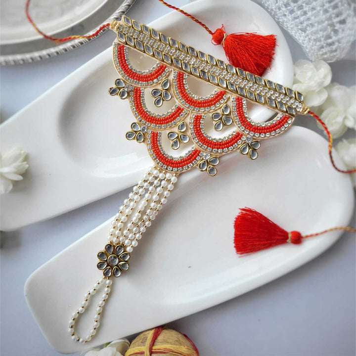Handmade Beaded Pearl Hathfool Rakhi Hamper With Roli Chawal For Bhaiya And Bhabhi - Close-up of main rakhi piece