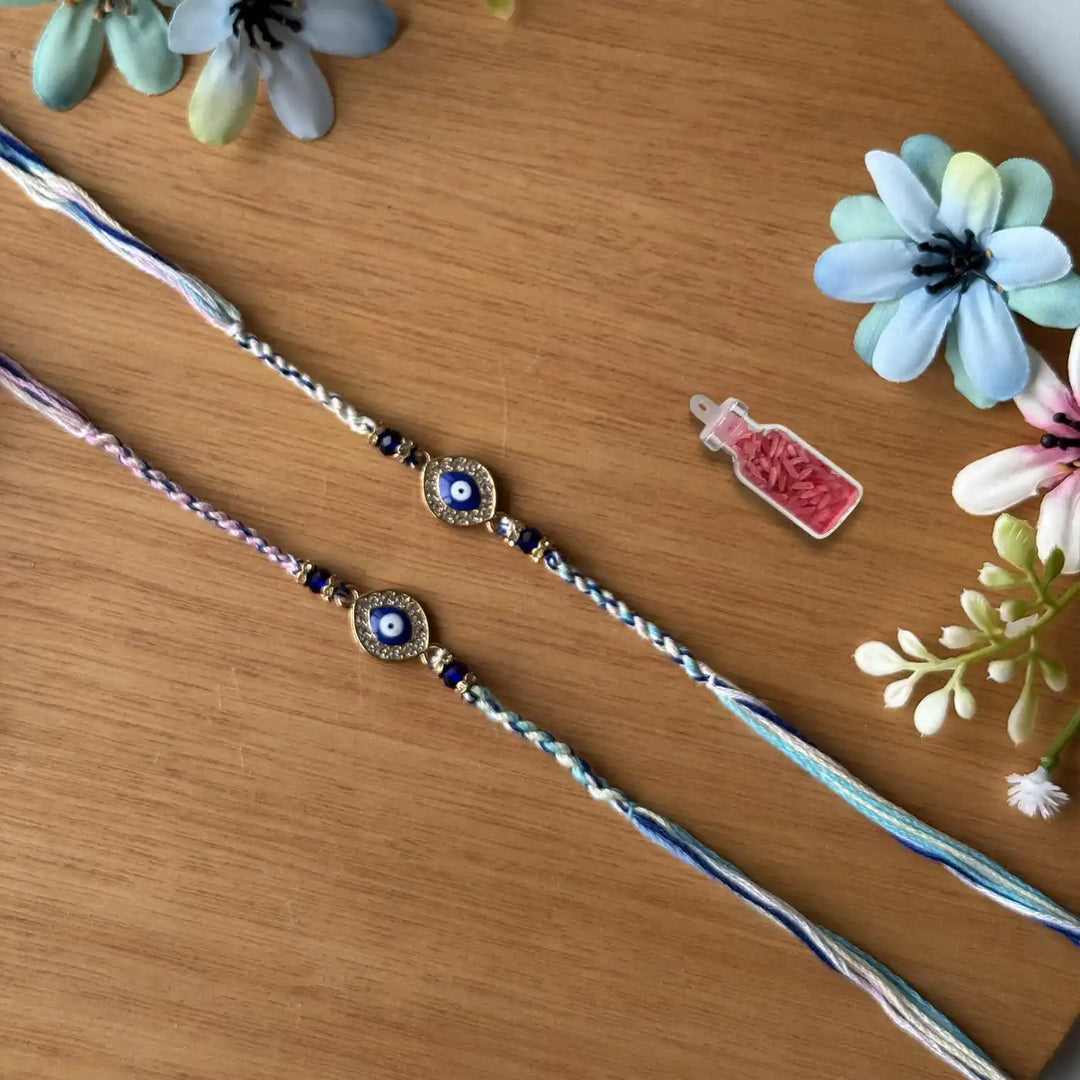 Handmade Stone Embedded Evil Eye Rakhi With Roli Chawal - Full Bracelet Styled Flat Lay
