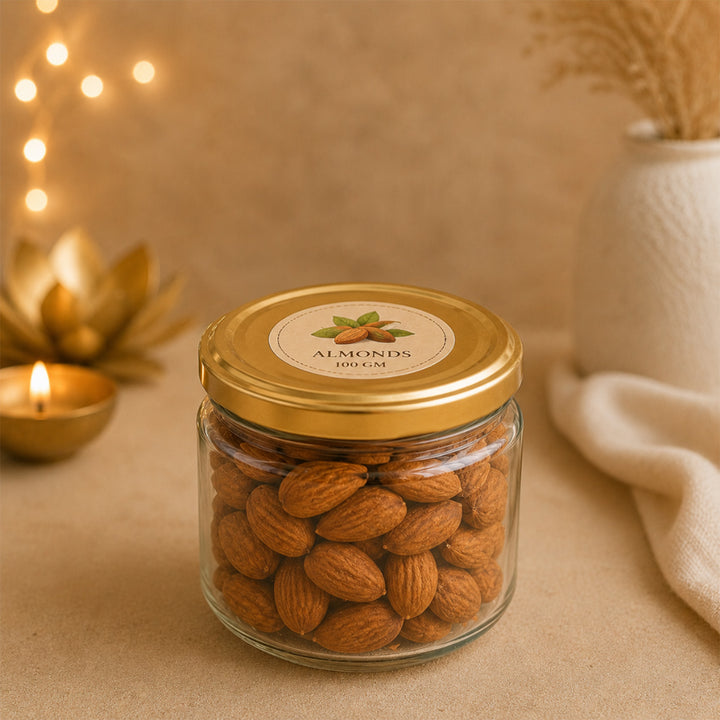 Emerald Festive Harvest Green Diwali Gift Hamper With Toran Potli, Urli Candle And Almonds For Festive Gifting
