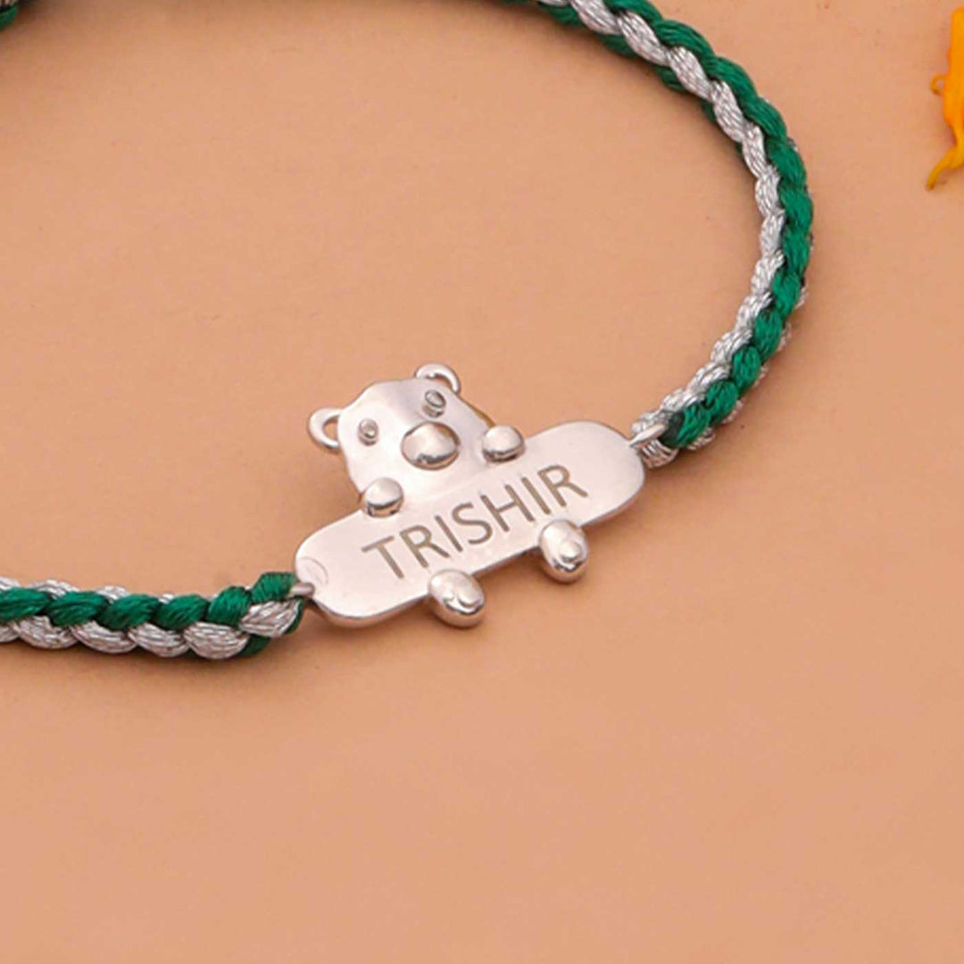 Personalized Handmade Bear Design Silver Kids Rakhi - Diagonal View of Bracelet Detail