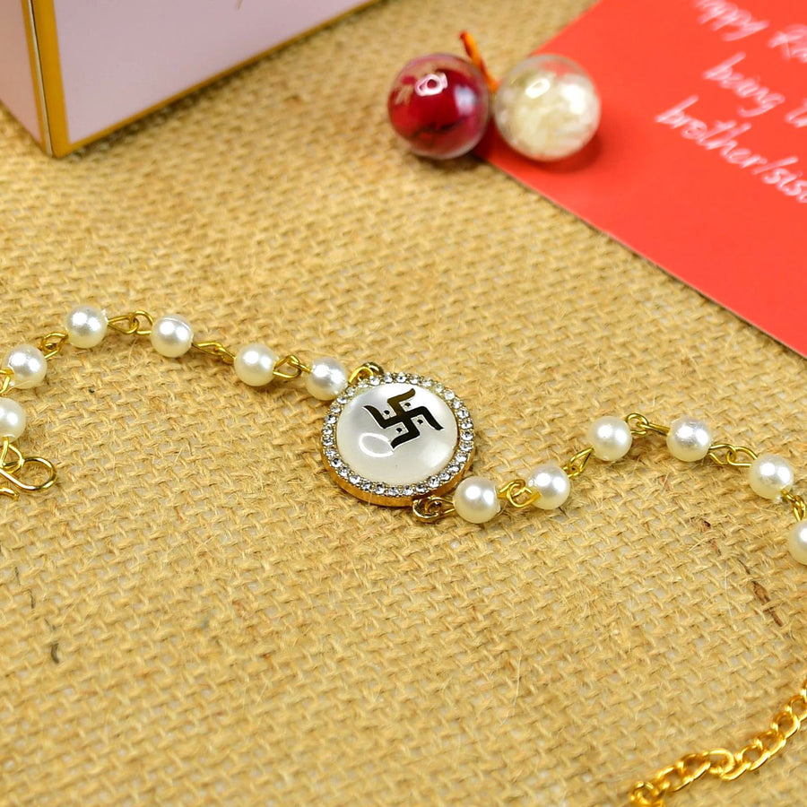 Beaded Swastik Bracelet Rakhi Hamper With Chocolates And Roli Chawal For Brother Customizable Options Includes Up To 7 Goodies - Close-up of pearl bracelet