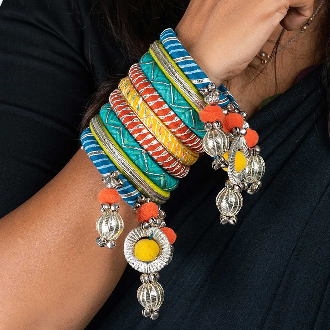 Multicolour Handcrafted Urvi Gotapatti with Pompom Ghugharu Bangles | Set of 9