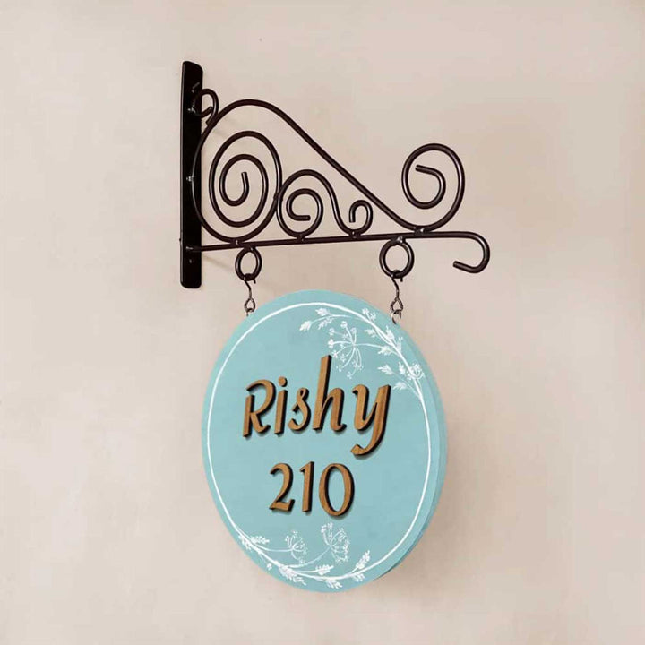 Personalized Hand Painted Blue Wood And Metal Name Plate - Side View Hanging from Decorative Bracket
