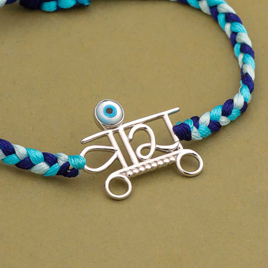 Handmade Veera Design Evil Eye Silver Rakhi For Brother - Close-up of Pendant Details