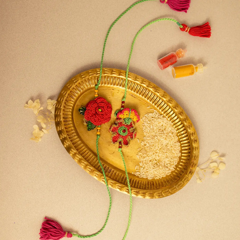 Handmade Crochet Pankhuri Rakhi With Roli Chawal Set Of 2 - Top View with Decorations
