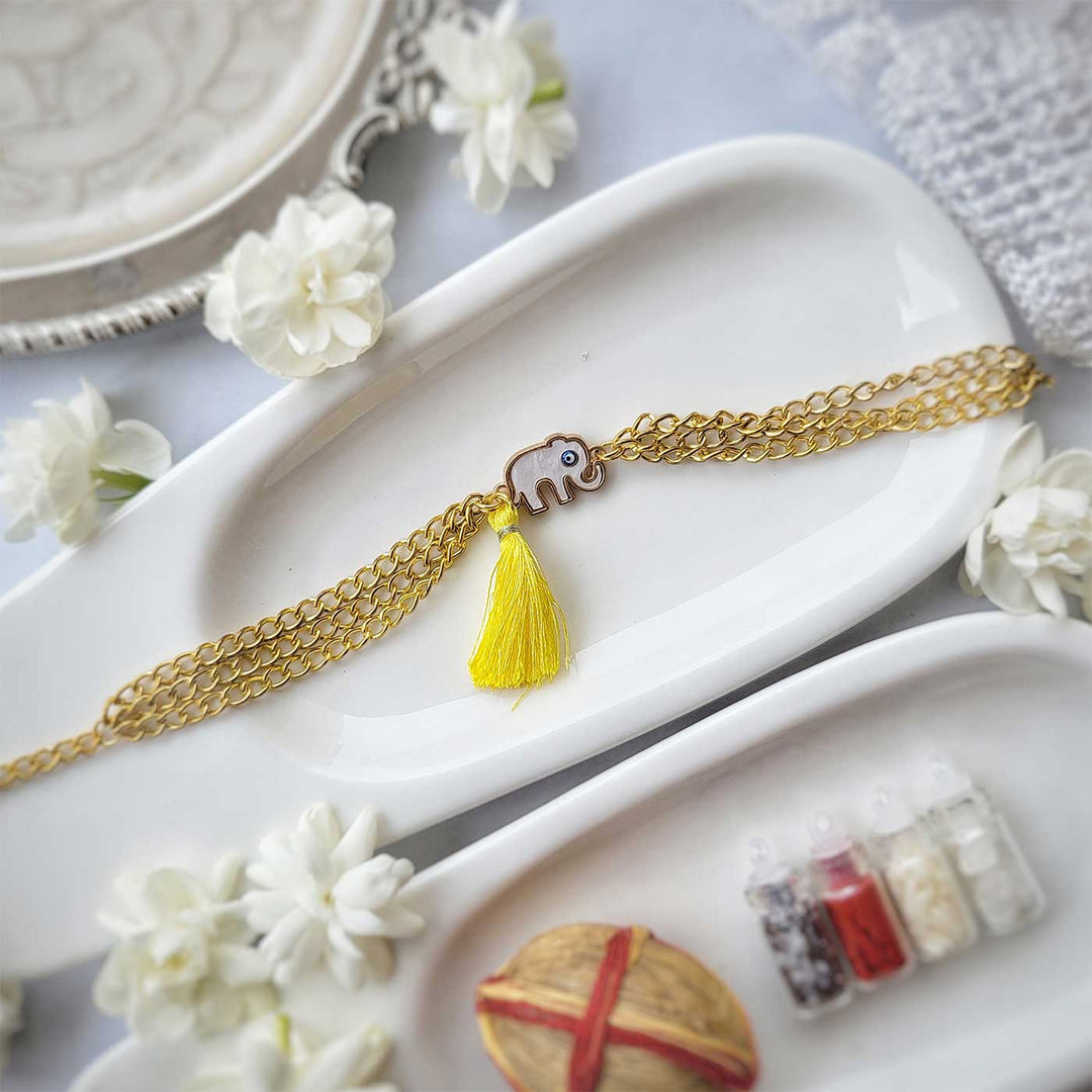Handmade Elephant Design Bracelet Rakhi Hamper With Roli Chawal For Sisters - Full length bracelet with yellow tassel