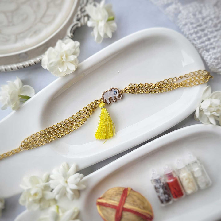 Handmade Elephant Design Bracelet Rakhi Hamper With Roli Chawal For Sisters - Full length bracelet with yellow tassel