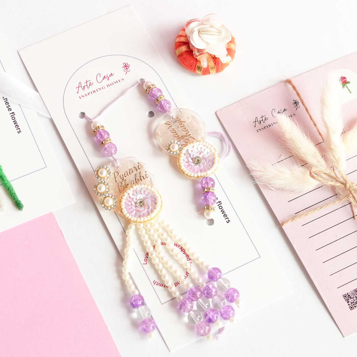 Personalized Handmade Crochet Tulip Light Purple Rakhi Hamper Includes 1 Crochet Flower 1 Message Card And 2 Rakhis And Roli Chawal - Close-up of Earrings Detail