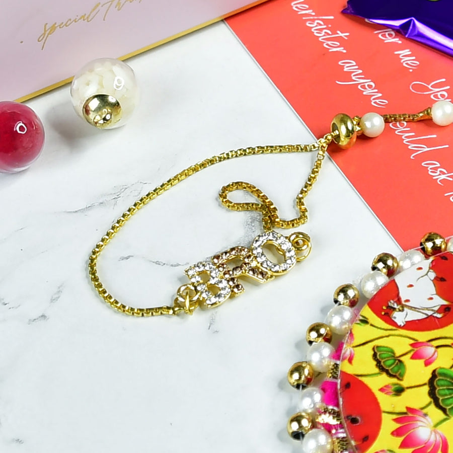 Beaded Bro Pearl And Stone Bracelet Rakhi Hamper With Chocolates And Roli Chawal For Brother Customizable Options Includes Up To 7 Goodies - Bracelet Close-up on Table