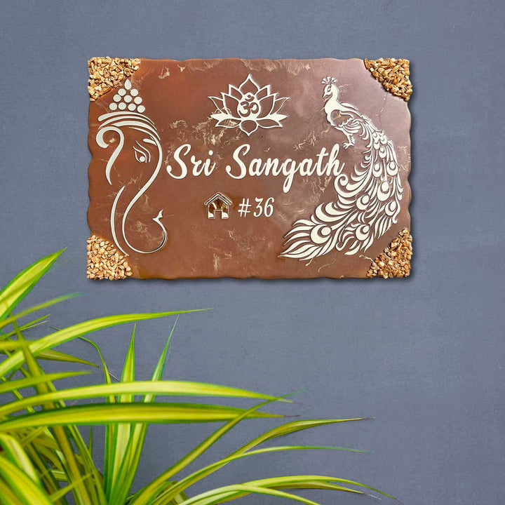 Personalized Metallic Brown Ganesha And Peacock Theme Resin Name Plate - Front View Mounted on Wall